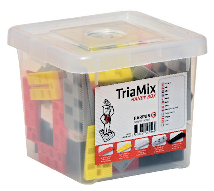 Plastlåda med etikett "TriaMix Handy Box" innehållande montagekilar i olika färger.